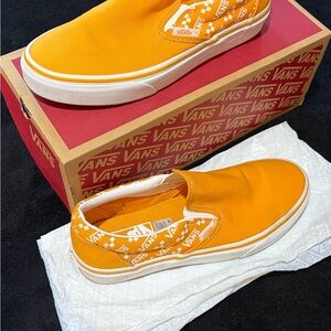Vans Bold Orange Slip-Ons with White Trim